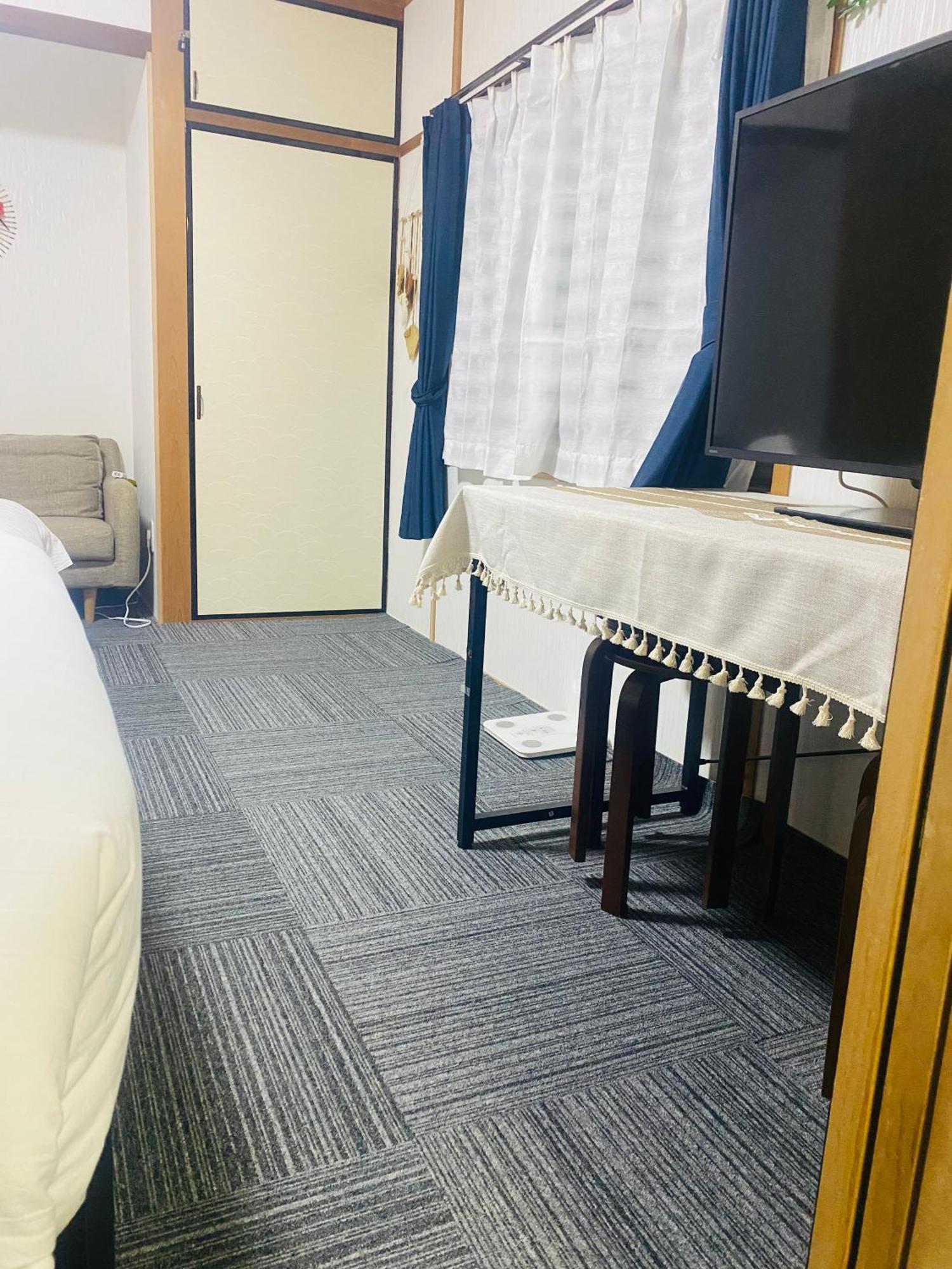 Appartement 大阪民宿梅田淀川花b套